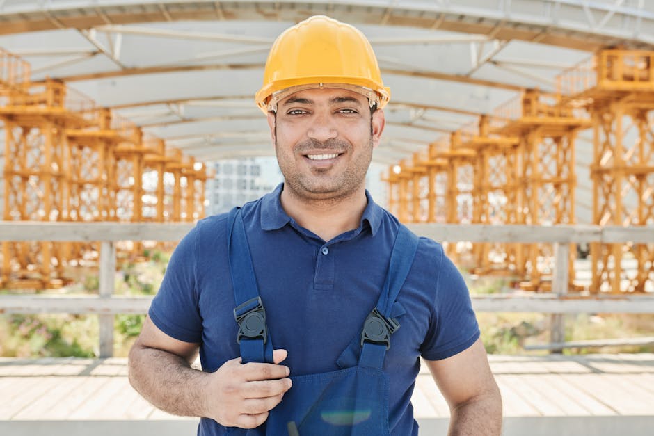 Professional construction worker smiling